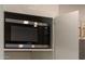 Samsung microwave is neatly installed inside the kitchen cabinet at 5449 E Cambridge Ave, Phoenix, AZ 85008