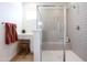 Contemporary bathroom with a glass shower enclosure, tiled walls, a vanity area and decorative accents for a stylish touch at 624 N Vine St, Chandler, AZ 85225