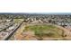 Wide aerial shot of a residential neighborhood with a community park and athletic field at 6333 N 49Th Ave, Glendale, AZ 85301