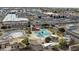 Aerial view of community pool with water features, shade structures, and recreation areas at 6333 N 49Th Ave, Glendale, AZ 85301