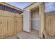 An open storage shed in a fully-fenced backyard with access to patio at 6333 N 49Th Ave, Glendale, AZ 85301