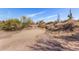 Desert home site featuring a private gated driveway entrance with native vegetation at 8115 E Paint Pony Dr, Carefree, AZ 85377