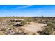 Desert home site featuring lush native vegetation, mature trees, mountain views, and bright sky at 8115 E Paint Pony Dr, Carefree, AZ 85377