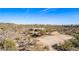 Desert home site featuring lush native vegetation, mature trees, and clear blue sky at 8115 E Paint Pony Dr, Carefree, AZ 85377