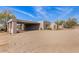 Exterior view with a porte-cochere showcasing a blend of desert charm and architectural features at 8115 E Paint Pony Dr, Carefree, AZ 85377