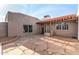 Inviting front entrance showcases flagstone patio, stylish front door, and charming desert home exterior at 8115 E Paint Pony Dr, Carefree, AZ 85377