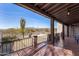 Large, covered patio with desert landscaping and beautiful mountain views at 8115 E Paint Pony Dr, Carefree, AZ 85377