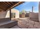 Private covered patio featuring flagstone floor and seamless transition to a walled-in outdoor retreat at 8115 E Paint Pony Dr, Carefree, AZ 85377