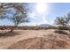 Expansive property showcasing desert landscaping, native trees and mountain views at 8115 E Paint Pony Dr, Carefree, AZ 85377