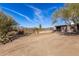 Expansive property with desert landscaping, mountain views and partially-covered patio at 8115 E Paint Pony Dr, Carefree, AZ 85377