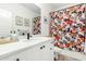 Bathroom with a shower and tub featuring a floral curtain and a modern vanity at 815 E Tucci St, San Tan Valley, AZ 85140