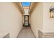 Bright and airy entryway featuring a modern front door, neutral walls, and stone accents at 815 E Tucci St, San Tan Valley, AZ 85140