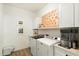 Neat laundry room with modern washer and dryer at 815 E Tucci St, San Tan Valley, AZ 85140