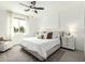 Serene main bedroom featuring neutral tones, ample natural light, and stylish furnishings for a relaxing retreat at 815 E Tucci St, San Tan Valley, AZ 85140