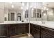 Bright bathroom with dual sinks, vanity, and neutral-toned walls at 9450 W Georgia Ave, Glendale, AZ 85305