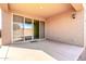 Spacious covered patio with sliding glass doors, perfect for outdoor entertaining at 9450 W Georgia Ave, Glendale, AZ 85305