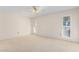 Cozy bedroom with neutral walls, carpet, and bright natural light at 10103 W Saddle Ridge Dr, Sun City, AZ 85373