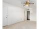 Spacious bedroom featuring neutral walls and carpet at 10103 W Saddle Ridge Dr, Sun City, AZ 85373