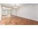 Bright, open living room boasts a beautiful chandelier and parquet floors at 10103 W Saddle Ridge Dr, Sun City, AZ 85373