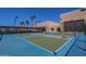 Outdoor pickleball courts with lighting make for a fun game, day or night at 10103 W Saddle Ridge Dr, Sun City, AZ 85373