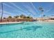 Enjoy the outdoors with this sparkling swimming pool and lounge area, ideal for relaxation and recreation at 10103 W Saddle Ridge Dr, Sun City, AZ 85373