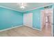 Bright bedroom with wood floors and closet at 1021 E Myrtle Ave, Phoenix, AZ 85020