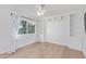 Bright bedroom with hardwood floors and a window seat nook at 1021 E Myrtle Ave, Phoenix, AZ 85020