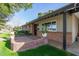 Charming front porch with brick accents and black trim at 1021 E Myrtle Ave, Phoenix, AZ 85020