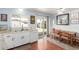 Efficient kitchen with white appliances and a cozy dining area at 1022 W Watson Dr, Tempe, AZ 85283