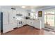 Functional kitchen featuring white appliances and adjacent dining area at 1022 W Watson Dr, Tempe, AZ 85283