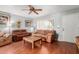 Light-filled living room with wood floors and neutral walls at 1022 W Watson Dr, Tempe, AZ 85283