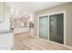 Open kitchen flows to backyard through sliding door with backyard patio area at 10404 W Tropicana S Cir, Sun City, AZ 85351