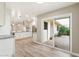 Bright and airy kitchen looks out onto backyard patio, featuring desert landscaping at 10404 W Tropicana S Cir, Sun City, AZ 85351