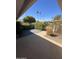 Private patio area with low maintenance landscaping and a view of the surrounding community at 10404 W Tropicana S Cir, Sun City, AZ 85351