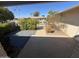 Secluded patio area offering a relaxing outdoor space with privacy and views of neighborhood at 10404 W Tropicana S Cir, Sun City, AZ 85351