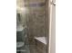 Newly remodeled shower featuring a clear glass door and a marble bench at 10404 W Tropicana S Cir, Sun City, AZ 85351