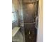 Shower featuring a grab bar and built-in seat at 10404 W Tropicana S Cir, Sun City, AZ 85351