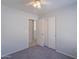 This is a bedroom with a ceiling fan and closet at 1110 W Seagull Dr, Chandler, AZ 85286