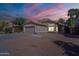 Charming single-story home with desert landscaping, tile roof, and an attached two-car garage at 1110 W Seagull Dr, Chandler, AZ 85286