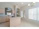 Kitchen featuring a center island, neutral cabinets, and an open layout at 1110 W Seagull Dr, Chandler, AZ 85286