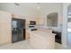 Well-equipped kitchen features a central island, ample counter space, and updated appliances at 1110 W Seagull Dr, Chandler, AZ 85286