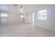 An open living space with tile floors and neutral colored walls at 1110 W Seagull Dr, Chandler, AZ 85286