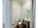 Charming powder room with a pedestal sink at 11818 N Vanero Ct, Maricopa, AZ 85139