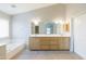 Bright bathroom features double sinks and a separate tub at 1249 W Seascape Dr, Gilbert, AZ 85233