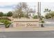 Decorative 'Elliot Shores' sign with landscaping accents at the entrance to a beautiful community at 1249 W Seascape Dr, Gilbert, AZ 85233