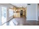 Kitchen with wood cabinets, stainless steel appliances, and sliding glass door to patio at 1249 W Seascape Dr, Gilbert, AZ 85233