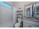 Clean bathroom features a tub-shower combo, modern fixtures, and ample lighting at 12859 W Calle De Baca --, Peoria, AZ 85383