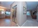 Hallway view of main bath and closet with double sliding mirror doors at 12859 W Calle De Baca --, Peoria, AZ 85383