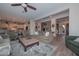 Spacious living room featuring an open layout, wood floors, and comfortable seating at 12859 W Calle De Baca --, Peoria, AZ 85383