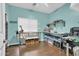 A spacious, light-blue room with stainless steel tables and ample storage space at 1322 S 118Th Dr, Avondale, AZ 85323